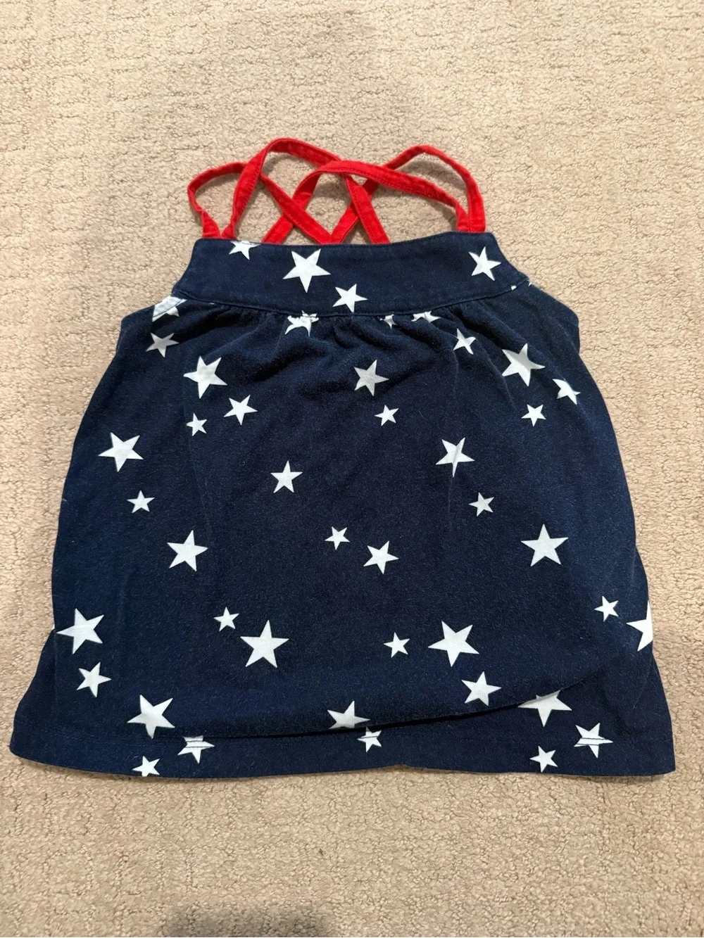 2 toddler tanks: plaid Oshkosh, star Carters